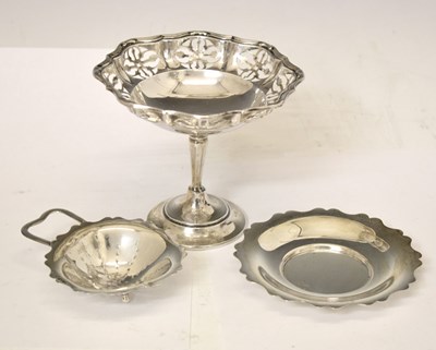 Lot 194 - George VI silver tea strainer and stand, and a George VI silver tea strainer and stand