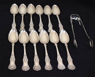 Lot 223 - Set of twelve Victorian Scottish silver Kings pattern teaspoons and a pair of matching sugar tongs