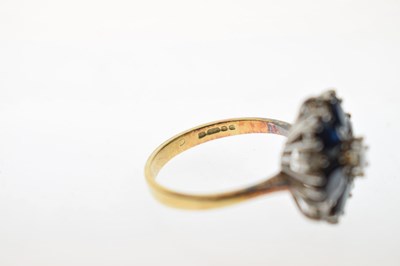 Lot 30 - Sapphire and diamond 18ct gold flower cluster ring