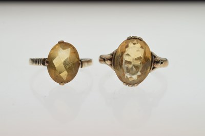 Lot 43 - Two citrine dress rings