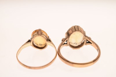 Lot 43 - Two citrine dress rings