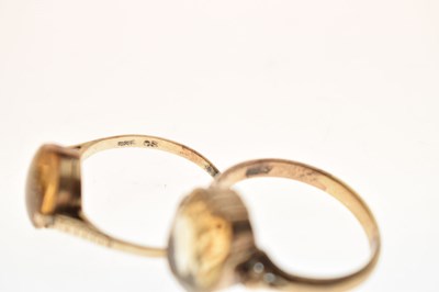 Lot 43 - Two citrine dress rings