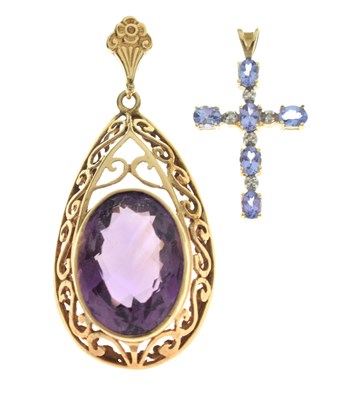 Lot 84 - Amethyst pendant and a tanzanite and diamond 9ct gold cross pendant