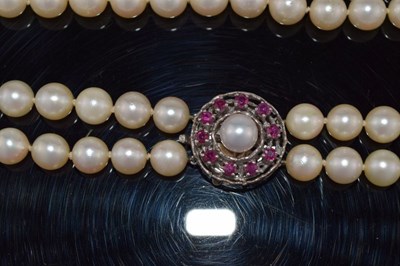 Lot 74 - Uniform two row cultured pearl necklace