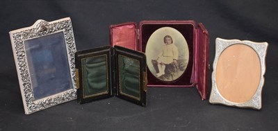 Lot 283 - Elizabeth II silver mounted photo frame, a white metal 835 standard photo frame, etc