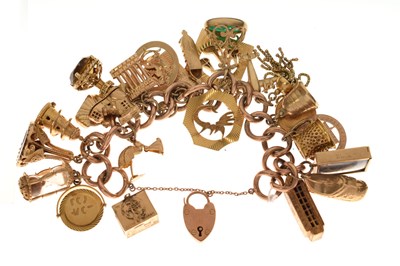 Lot 114 - 9ct gold charm bracelet