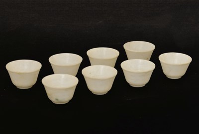 Lot 251 - Cased set of eight Chinese white jade miniature bowls