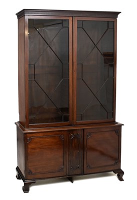 Lot 640 - George III mahogany library bookcase on cabinet