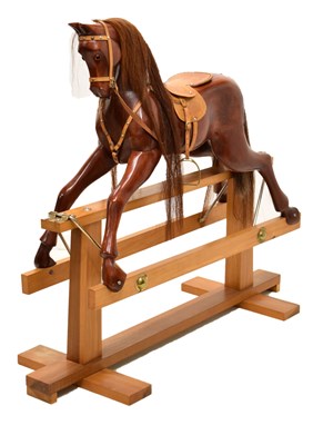 Lot 475 - Contemporary carved hardwood rocking horse by Margaret Spencer