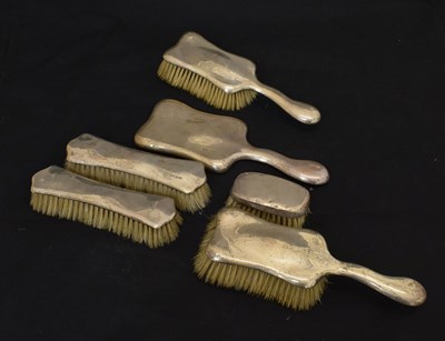 Lot 214 - Set of early 20th century silver dressing brushes and mirror