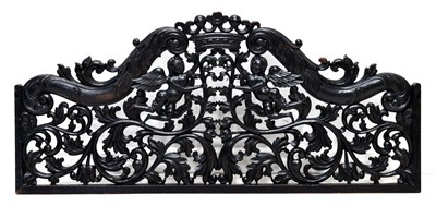 Lot 450 - Colonial carved ebonised hardwood cresting panel