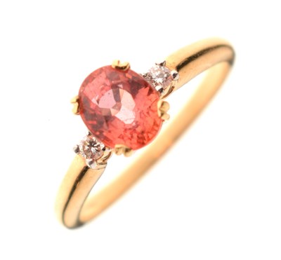 Lot 39 - Orange sapphire and diamond 18ct gold ring