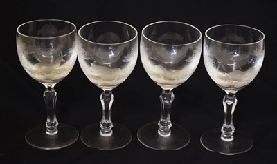 Lot 461 - Set of four wine glasses etched with African animals