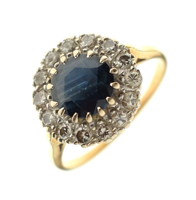 Lot 32 - 18ct gold sapphire and diamond cluster ring