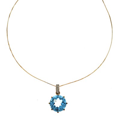 Lot 131 - Blue topaz and diamond 9ct gold pendant necklace