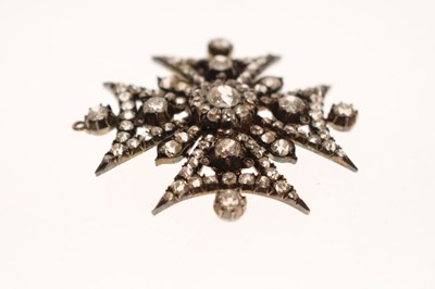 Lot 22 - Victorian diamond yellow and white metal brooch in the form of a Maltese Cross