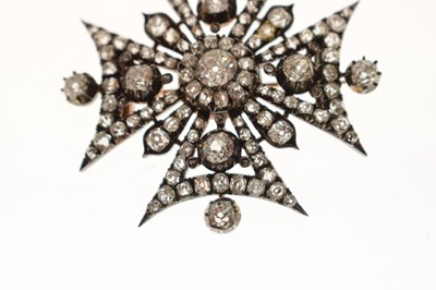 Lot 22 - Victorian diamond yellow and white metal brooch in the form of a Maltese Cross