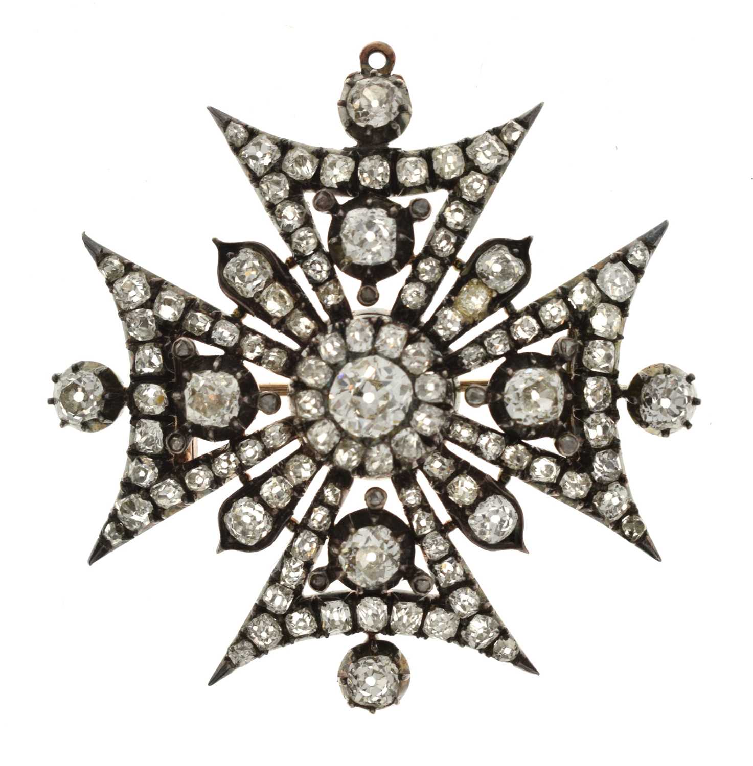 Lot 22 - Victorian diamond yellow and white metal brooch in the form of a Maltese Cross