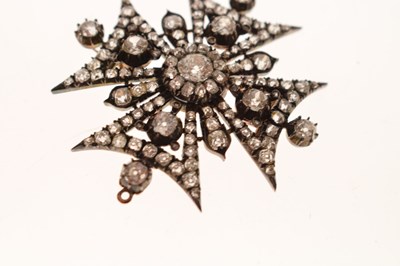 Lot 22 - Victorian diamond yellow and white metal brooch in the form of a Maltese Cross