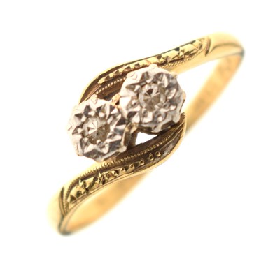 Lot 15 - Two-stone crossover illusion set diamond ring