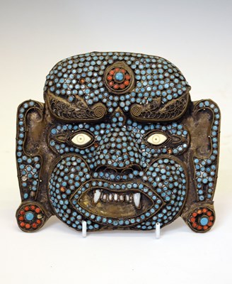 Lot 265 - South East Asian sheet brass mask of Mahakala