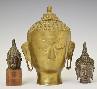 Lot 546 - Three South East Asian alloy busts of the Buddha