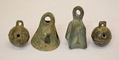 Lot 354 - Two early patinated alloy crotal bells