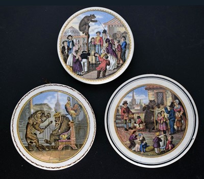 Lot 496 - Three 19th century Pratt ware pot lids The Bear Pit, The Village Wakes, and Bear, Lion & Cock