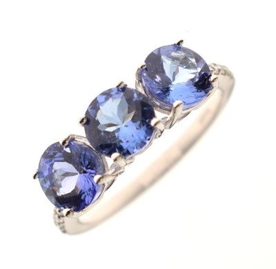 Lot 57 - 18ct white gold, three tanzanite ring