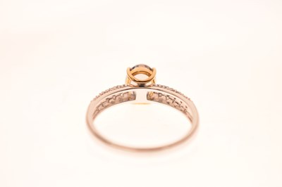 Lot 54 - 18ct white gold 'Chameleon' tanzanite and diamond ring