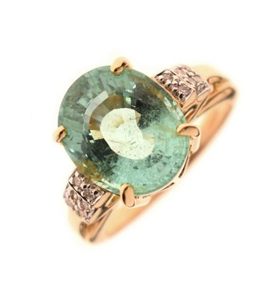 Lot 59 - 18ct gold, Paraiba tourmaline (5.3ct oval) and diamond ring