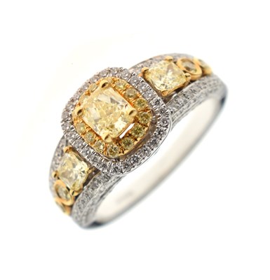 Lot 62 - 18ct white gold, yellow and white diamond ring