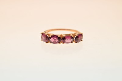 Lot 68 - Pink four-stone 14ct gold dress ring