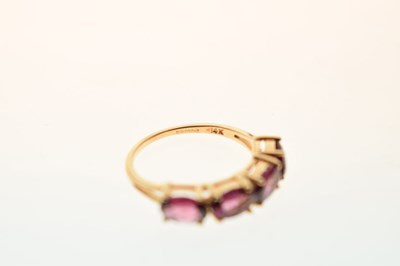 Lot 68 - Pink four-stone 14ct gold dress ring