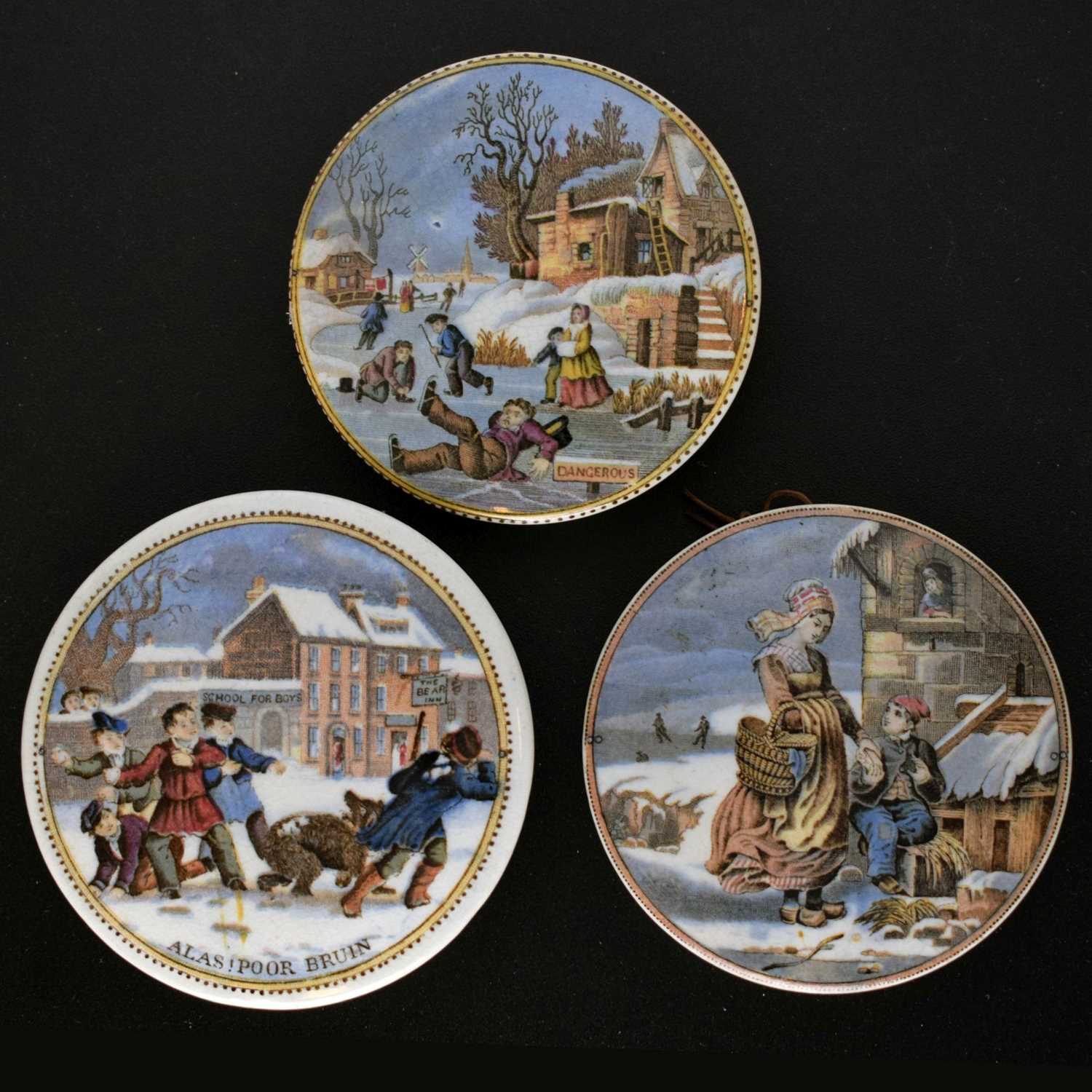 Lot 476 - Three 19th century Pratt ware pot lids Dangerous Skating, Alas Poor Bruin, and Dutch Winter Scene