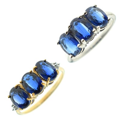 Lot 83 - Two 9ct gold dress rings, each set three blue stones