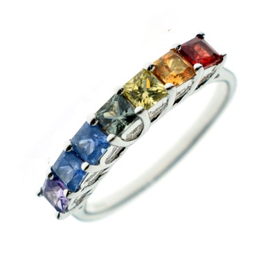 Lot 71 - Fancy coloured sapphire seven-stone 9ct white gold ring