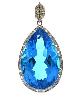 Lot 127 - Lorique - Swiss blue topaz and diamond 18ct white gold pendant