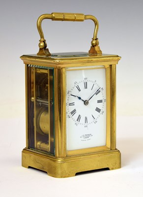 Lot 440 - J. W. Benson (retailer) - Brass cased two train carriage clock