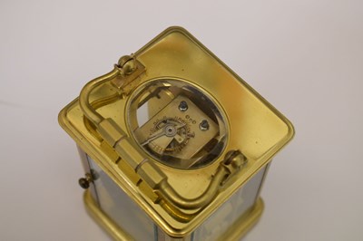 Lot 440 - J. W. Benson (retailer) - Brass cased two train carriage clock