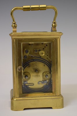 Lot 440 - J. W. Benson (retailer) - Brass cased two train carriage clock