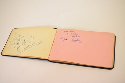 Lot 197 - A set of Beatles autographs on a single page with autograph album