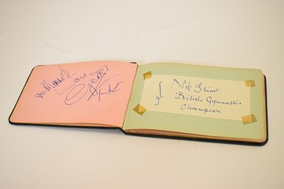 Lot 197 - A set of Beatles autographs on a single page with autograph album