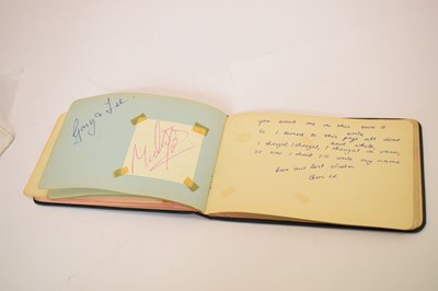 Lot 197 - A set of Beatles autographs on a single page with autograph album