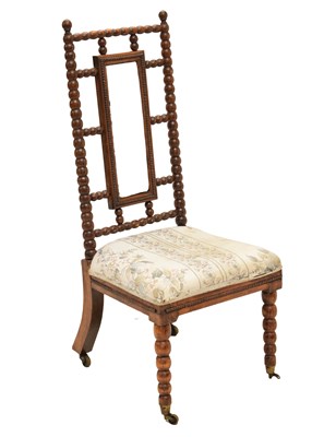 Lot 639 - Late 19th century bobbin-turned nursing chair