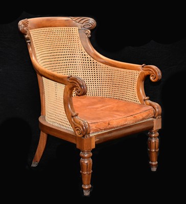 Lot 481 - William IV bergere caned tub library chair with cushion