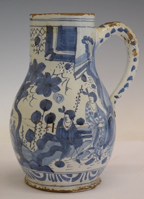 Lot 517 - 18th century Dutch Delft flagon or jug