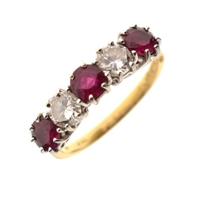 Lot 46 - Ruby and diamond five-stone 18ct yellow gold ring