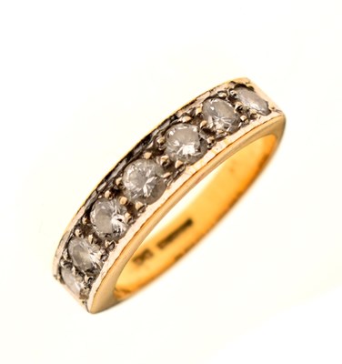 Lot 10 - Diamond seven-stone 18ct gold half eternity ring