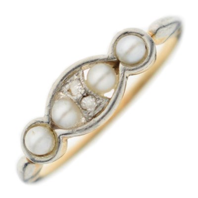 Lot 45 - Early 20th century seed pearl and diamond yellow and white metal ring